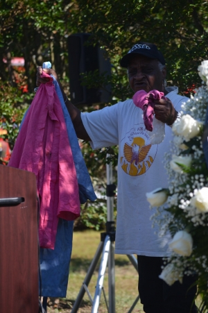 Imperial Foods fire survivor Ada Blanchard holds up the clothes she wore 30 years ago during a memorial service Friday morning. See more photos from the service at the RO&#039;s Facebook page.