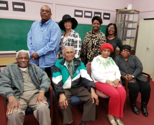 The Richmond County Martin Luther King Jr. Celebration Foundation Committee poses for a photo prior to releasing its schedule of events to honor the fallen civil rights hero.