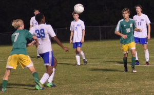 Richmond&#039;s Patrick Hamilton (7) contests for the ball in Wednesday&#039;s 8-2 bashing of Scotland County.