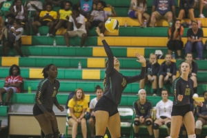 Senior middle hitter Brianna Baysek led a late third-game charge to lift Richmond past Lee County Wednesday night.