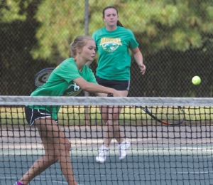 Senior Elizabeth Burns (front) and Taylor Parrish (back) in action Tuesday against Purnell Swett.