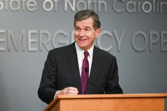 Gov. Roy Cooper during a press conference.