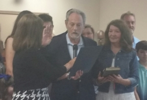 Hamlet City Council member Joe Robinson is sworn in at Tuesday&#039;s meeting. Robinson was appointed last month to replace Johnathan Buie, who resigned due to a job transfer.