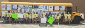 RSHS Beta Club members accept donations during RCS&#039; &quot;Stuff the Bus&quot; Campaign