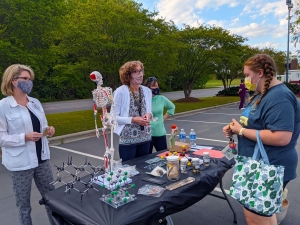  From left to right, Richmond Community College biology instructor Charlotte Carter, chemistry instructor Mary Anne Evans and biology instructor Natalie Thompson provided information about the Associate in Science degree program at the Program Fair on Tuesday at the Cole Auditorium.