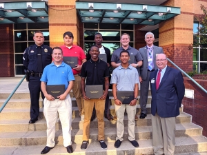 Pictured are the graduates of the 2020 Basic Law Enforcement Training Program, along with Rockingham Patrol Sergeant Ronnie Brigman, Rockingham Police Chief Billy Kelly and Dr. Dale McInnis, president of Richmond Community College.