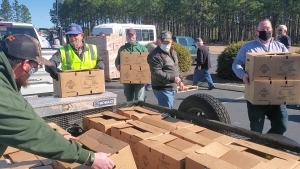 Members of churches affiliated with the Pee Dee Baptist Association load vehicles with food boxes from the USDA Farmers to Families program Monday at Freedom Baptist Church. See a video on the RO&#039;s Facebook page.