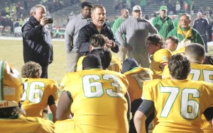 Head coach Bryan Till addresses the Raiders after their second-round playoff loss on Friday.
