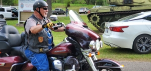Gary Holt, president of Ol Skool Tribe Riding Club, pulls into the VFW at the end of a benefit ride earlier this month.