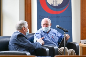 Art Pope, chairman of the John William Pope Foundation, shakes hands with Tom Ross, president of the The Volcker Alliance and co-chair of North Carolinians for Redistricting Reform on September 29, 2021 at the Sanford School of Public Policy.