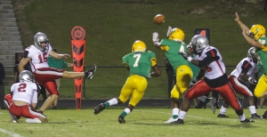 Richmond&#039;s Tony McRae (7) and Jamel Baldwin (4) block Butler&#039;s Alex Hartnell&#039;s 29-yard field goal attempt in the fourth quarter of Friday&#039;s 27-21 loss.