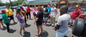 Richmond County Special Olympics Coordinator Theressa Smith organizes her athletes Friday before they load up to compete at the state games in Raleigh.