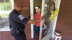 Hamlet Police Chief Tommy McMasters stops at a home Saturday to hand out contact information and ask if there have been any issues in the area during the department&#039;s first phase of &quot;Neighborhood Sweep.&quot; See video of the effort on the RO&#039;s Facebook page.