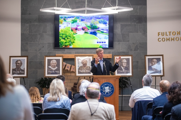 Bill Crowder addresses guests during a dedication ceremony at Wingate University.