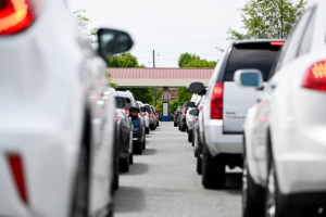 Cars line up to pump gas at the Costco in Raleigh on Wake Forest Road on Tuesday, May 11. 