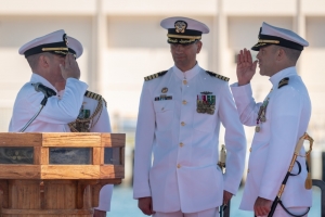 Cmdr. Matthew Lewis (right) is relieved of command of the Virginia-class fast-attack submarine USS North Carolina (SSN 777), by Cmdr. Michael Fisher (left) during a change of command ceremony at Joint Base Pearl Harbor-Hickam, Hawaii, May 31. 