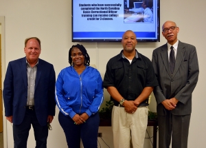  Pictured, from left to right, Dr. Hal Shuler, associate vice president of development at Richmond Community College; Kendrina Crowder, pharmacy tech graduate; Stanley Franklin, truck driver training graduate; and Douglas M. Fulford Jr., State Employees Credit Union vice president city executive. Not pictured are scholarship recipients Sandy Faircloth and Veraka Sturdivant, also truck driver training graduates.