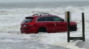 A Jeep Patriot stuck in the surf on Myrtle Beach became a meme sensation Thursday as Hurricane Dorian moved north just off the coast of South Carolina.