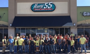 Riders in the Andy&#039;s Foundation charity ride pose for a photo outside of Highway 55 in Rockingham.