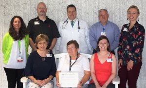 The FirstHealth Clinical Trials team: (standing from left) Pam Mason, R.N.; Matt Sherer; Charles S. Kuzma, M.D.; Barry Baber, R.N.; Anne Krembel; and (seated) Tina Thompson; Alice Romans-Hess, Ph.D.; and Julie Williams, Ph.D.
