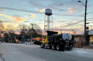 State transportation crews have been brining roads across the state since Wednesday in advance of the year&#039;s fourth winter storm. In this photo, NCDOT crews on Friday morning spread brine on a street in Jackson, a town in Northampton County.  