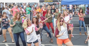 Hundreds of beer and wing enthusiasts gathered for the third annual Hoptoberfest festival on Saturday, an event presesnted by the Richmond County Chamber of Commerce and Tri-City, Inc.