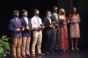 Summa Cum Laude students received plaques for their achievement.