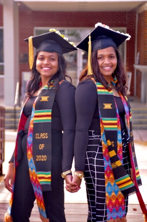 Twins Kelsey and Kyria Locklear, of Red Springs, crossed the stage, receiving matching degrees during Fall Commencement at UNCP.